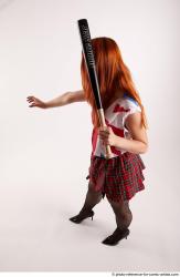 TINA STANDING POSE WITH BASEBALL BAT #2